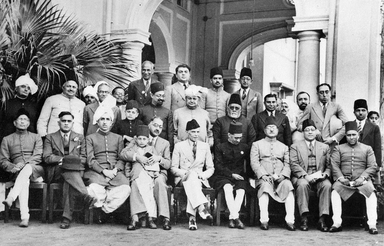 

Muslim League leaders after a dinner party given at the residence of Mian Bashir Ahmad, Lahore, 1940. Group portrait with Jinnah seated in the centre. (British Library)
